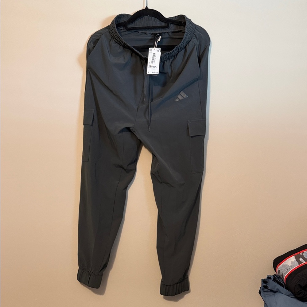 Adidas women’s size small, Dark Gray Cargo Pants NWT
MSRP $60.00